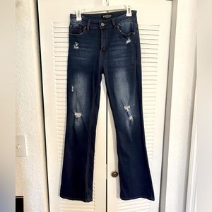 Stretchy dark distressed denim! Super comfortable and high waisted!